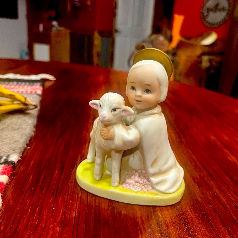 Homco girl with lamb figurine.